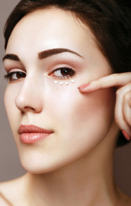 Woman with cream on her face